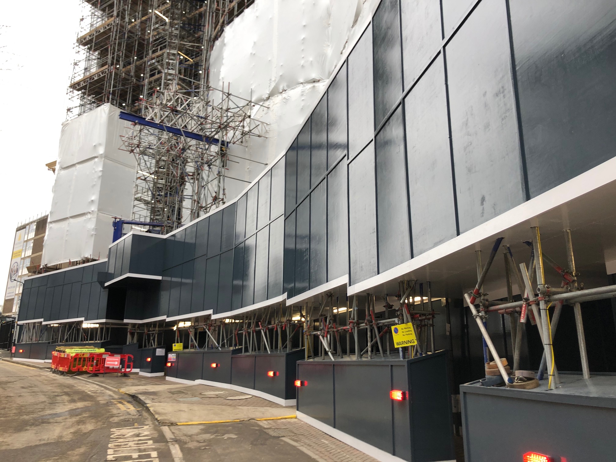 Victoria Halls - external timber hoarding fixed to scaffold